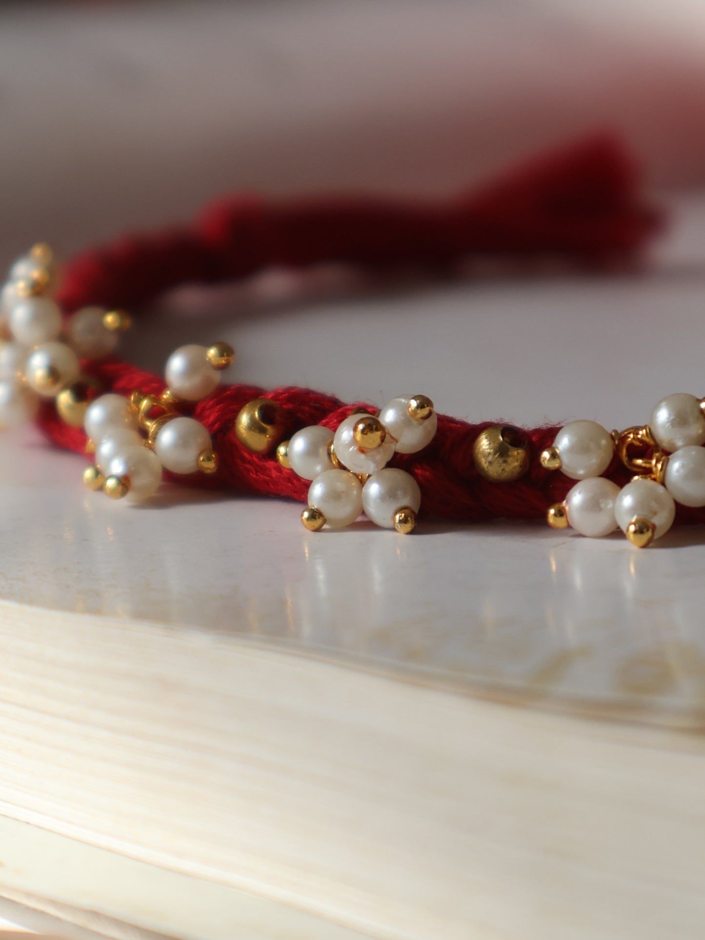 Joey Red Pearls Rakhi